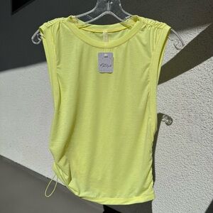 FREE‎ PEOPLE MOVEMENT yellow workout top NWT